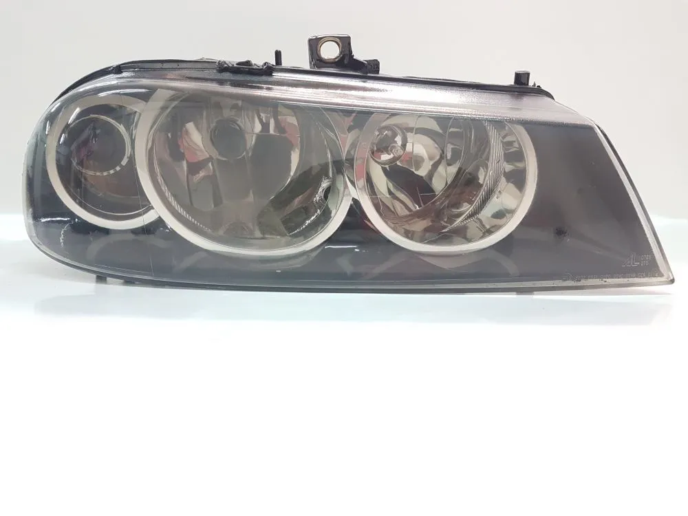 FARO ANTERIORE DESTRO con codice 60695647 da PASSEGGERO ALFA ROMEO 156 Berlina Serie (932_) (03>05) 1900 Diesel 85 (2005)