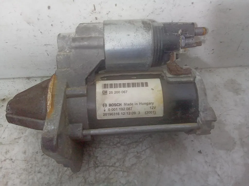 MOTORINO D' AVVIAMENTO con codice 0001192087 25200067 da OPEL Corsa E 3° Serie B14XER OPT bifuel/gas 1398 (15>)