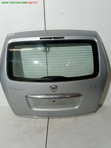 PORTELLO ARGENTO MET . CON MOTORINO (SENZ. FANALINO FRENO) LANCIA - MUSA - 2004 > 2007 CODICE/I: 999-U1309862 OE 51732303