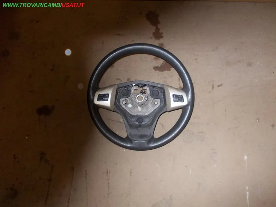 VOLANTE PLASTICA GRIGIO CON COMANDI RADIO OPEL CORSA (S07)