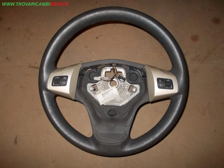 VOLANTE PLASTICA GRIGIO CON COMANDI RADIO OPEL CORSA (S07)